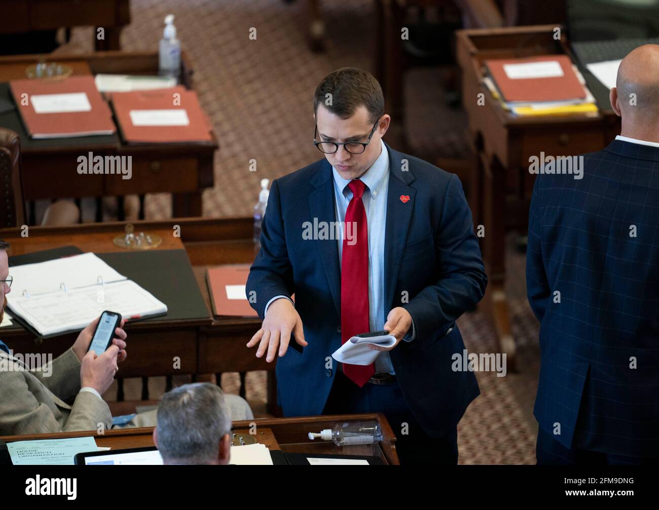 Austin, TX, USA. 6th May, 2021. The Texas House debating SB 7 late into the night a controversial omnibus elections bill that would make changes to the way Texas elections are held. Rep. BRISCOE CAIN, R-Houston, looks for votes. Credit: Bob Daemmrich/ZUMA Wire/Alamy Live News Stock Photo