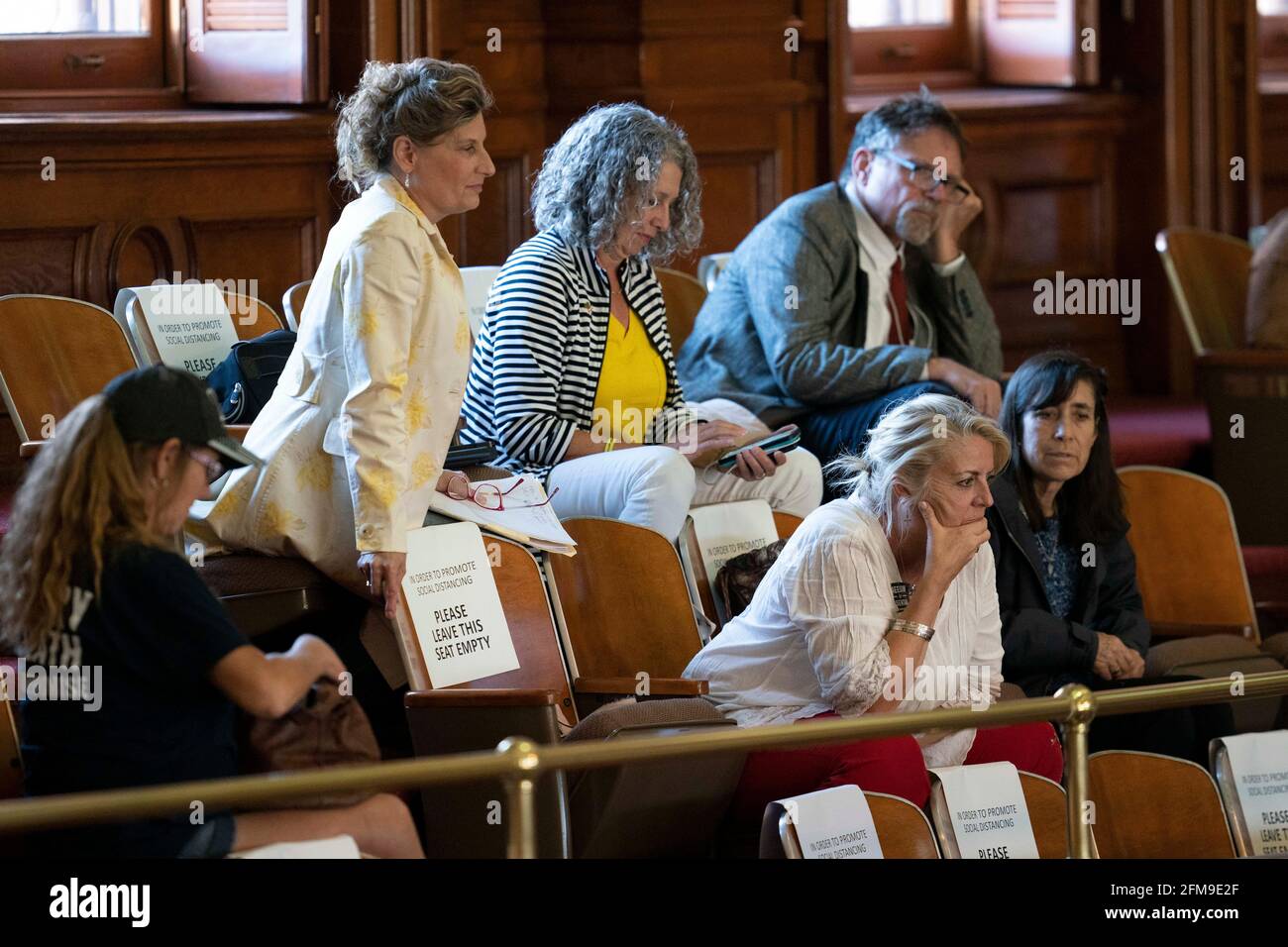 May 6, 2021, Austin, TX, United States: The Texas House debating SB 7 late into the night  a controversial omnibus elections bill that would make changes to the way Texas elections are held.  Members of the public keep tabs on the vote in the House gallery. (Credit Image: © Bob Daemmrich/ZUMA Wire) Stock Photo