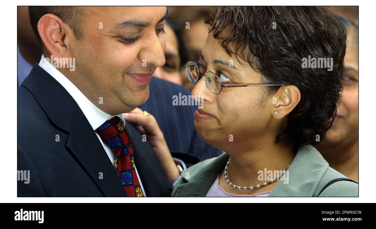 Trupti Patel with husband Jay outside Reading Crown Court after not guilty verdict.pic David Sandison 11/6/2003 Stock Photo