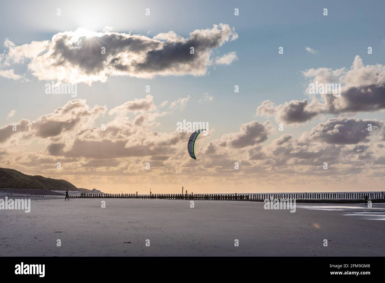 Kite on the beach at low tide on Wangerooge Stock Photo
