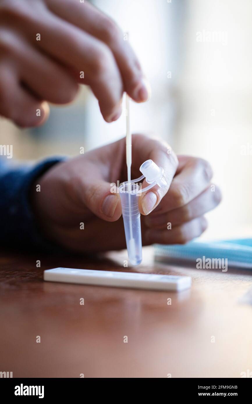 Close up of a person using coronavirus covid19 rapid antigen home
