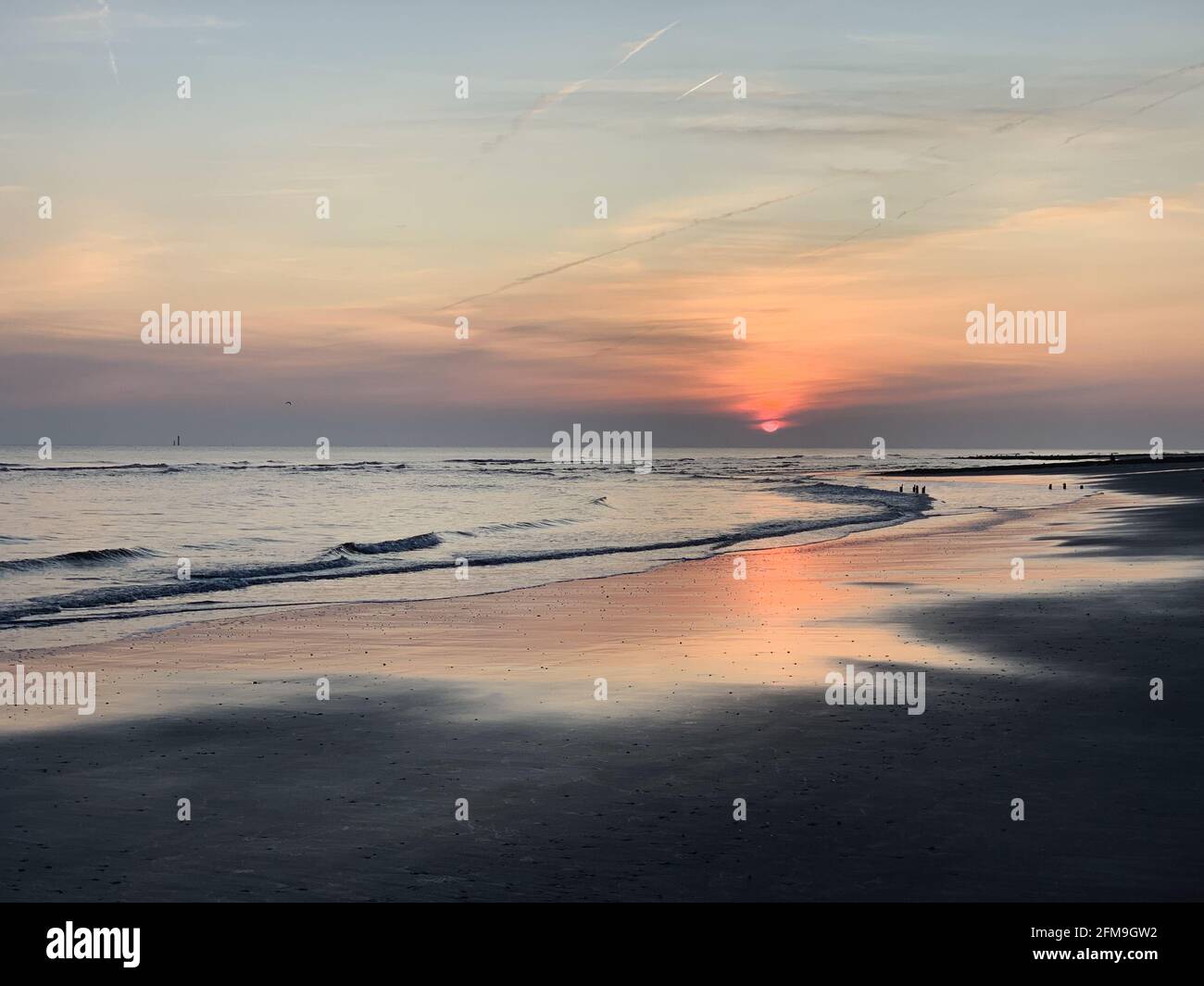 Nordeestrand auf Wangerooge at low tide in the early morning at sunrise Stock Photo