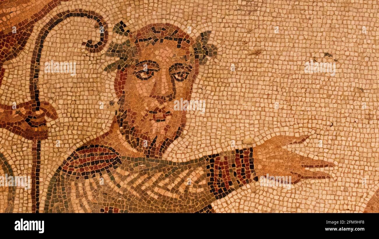Italy, Sicily, Piazza Armerina, Villa Romana Del Casale, Roman floor mosaic, Bacchus the wine god Stock Photo