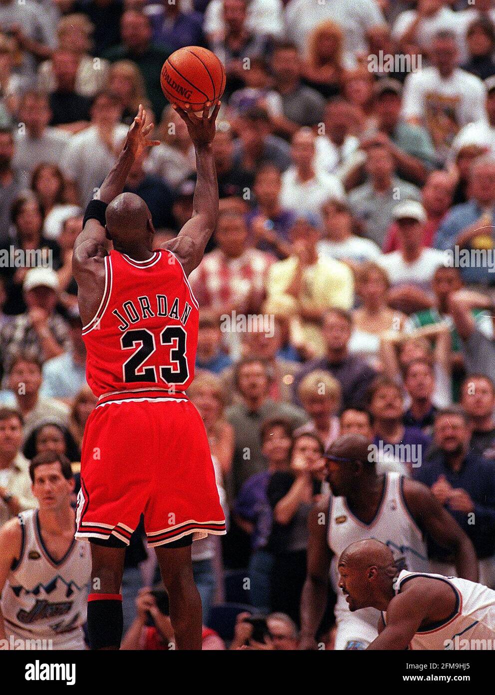 USA. 05th May, 2021. Michael Jordan works his magic as he shoots over Bryon Russell to seal the win and the Bulls' sixth NBA championship. (Photo by Phil Velasquez/Chicago Tribune/TNS/Sipa USA) Credit: Sipa USA/Alamy Live News Stock Photo