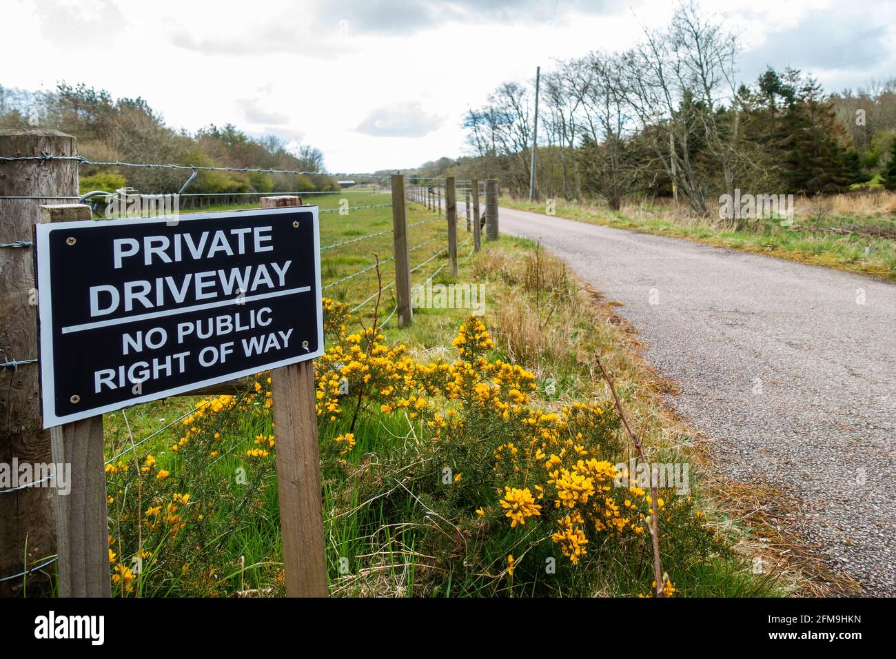 Sign stating private driveway no public right of way on a rural country road in the UK Stock Photo