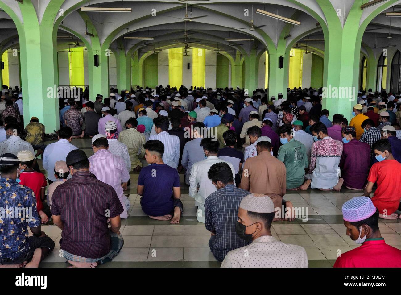 Muslims perform Jumma prayers at the Anderkilla Shahi Jame Mosque.This day is called Alvida Jumma and Jumma tul Wida in different parts of the World. Muslims performed the jumma prayers without maintaining any kind of social distance the country will be put under nationwide lockdown till May 16 to contain the spread of the second wave of the Covid-19 pandemic. It is believed that the Last Jumma of the year is the most Holy and fruitful Jumma. Those who pay Namaz on this day every wish of them will be answered by Allah. (Photo by Dey Joy / SOPA Images/Sipa USA) Stock Photo