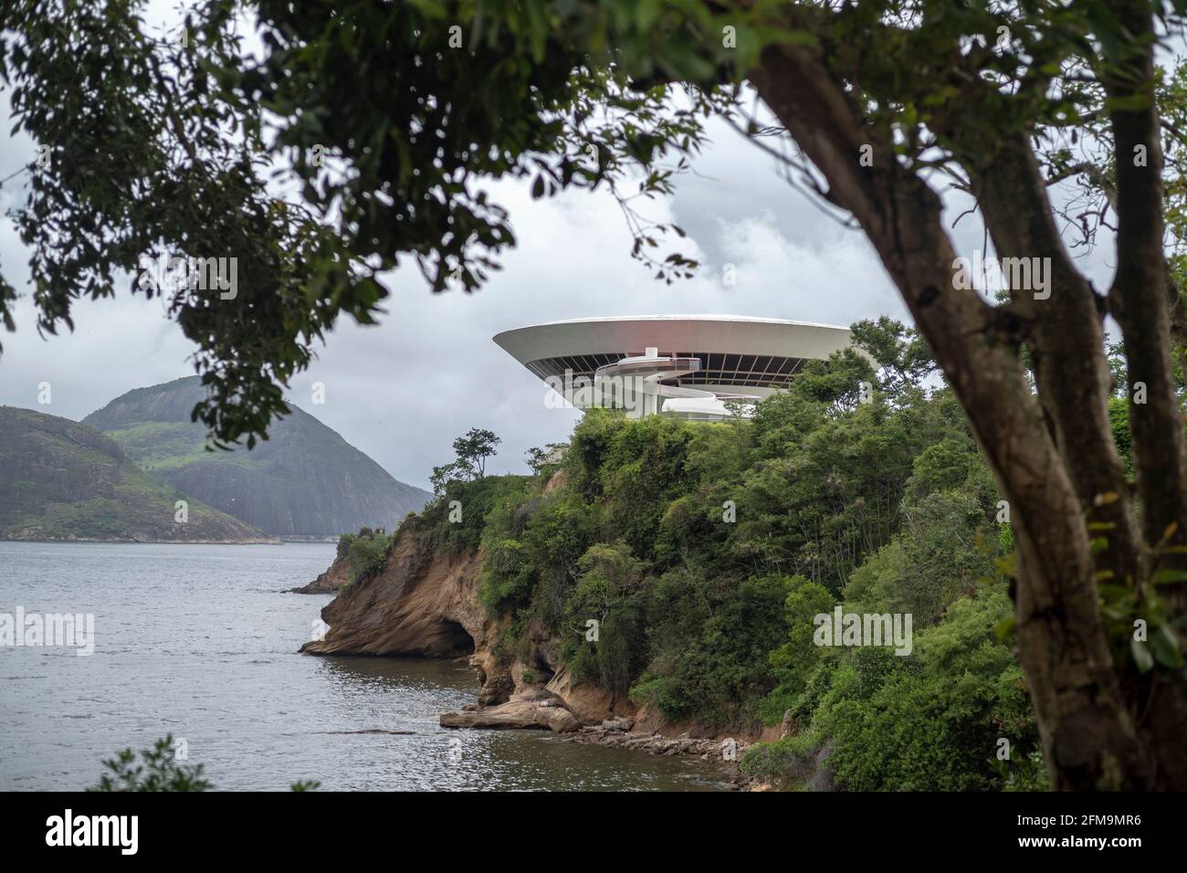 Extraterrestrial: Niteroi Contemporary Art Museum (MAC) designed by Oscar Niemeyer in the city of Niteroi, Rio de Janeiro, Brazil. Shot with leica m10 Stock Photo