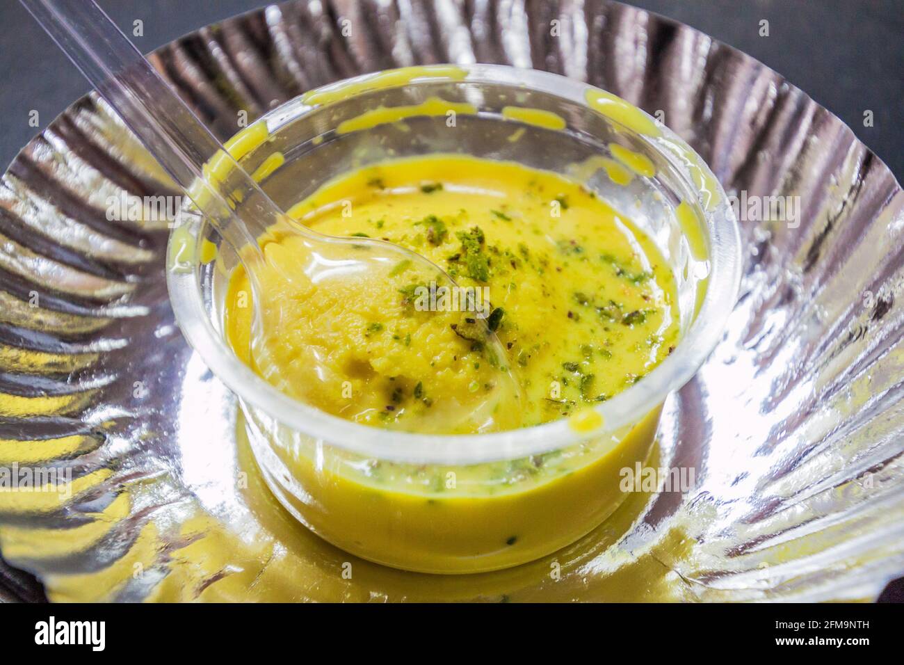 Pistachio ice cream - street food in Udaipur, Rajasthan state, India Stock Photo