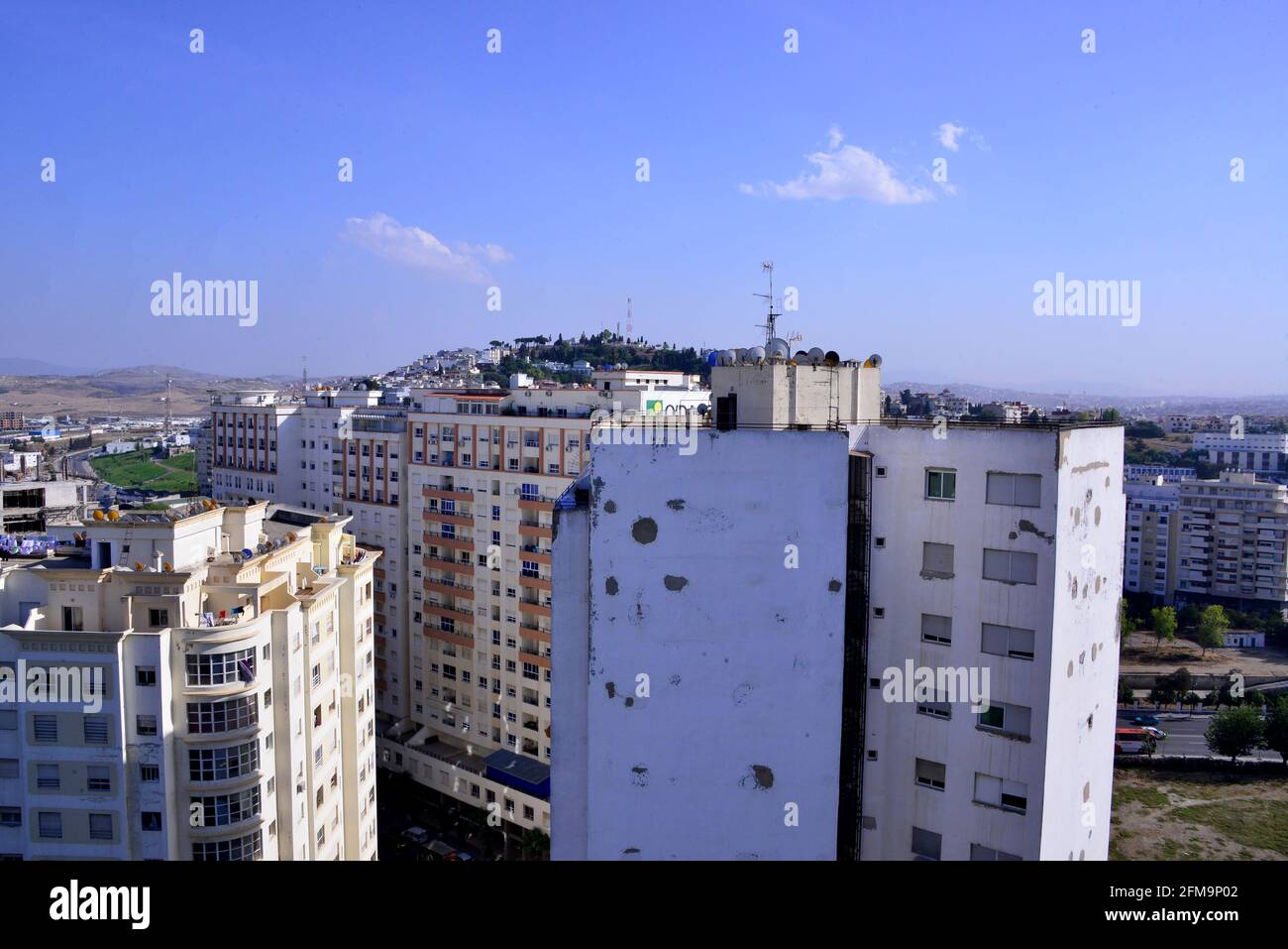 White houses on the mountain slope in royal town Tangier near Tetouan  , Morocco Stock Photo