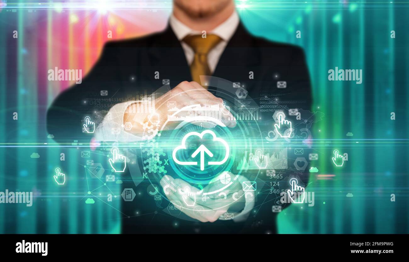 Businessman holding technology icon concept Stock Photo