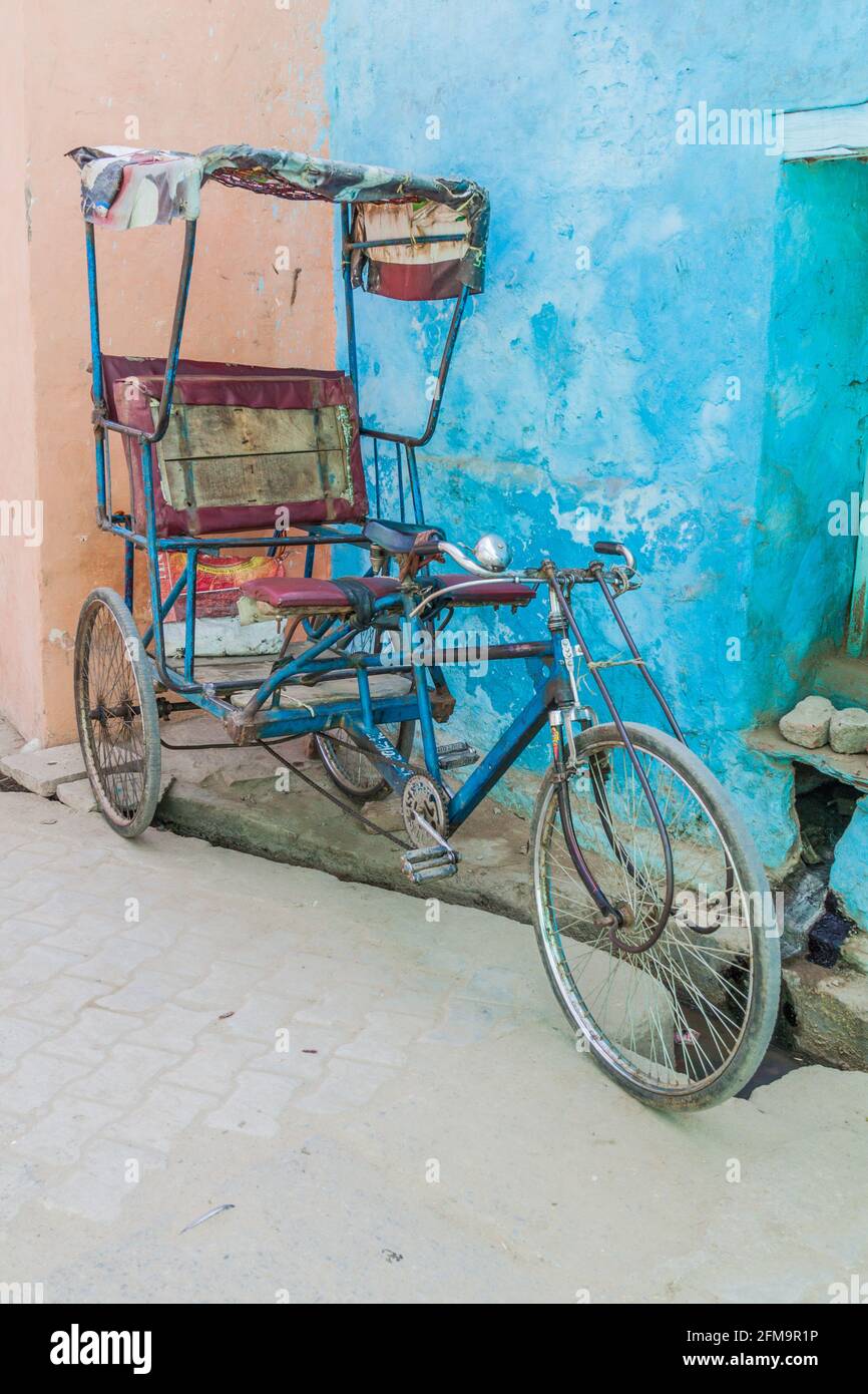 Rickshaw on a street in Vrindavan, Uttar Pradesh state, India Stock Photo