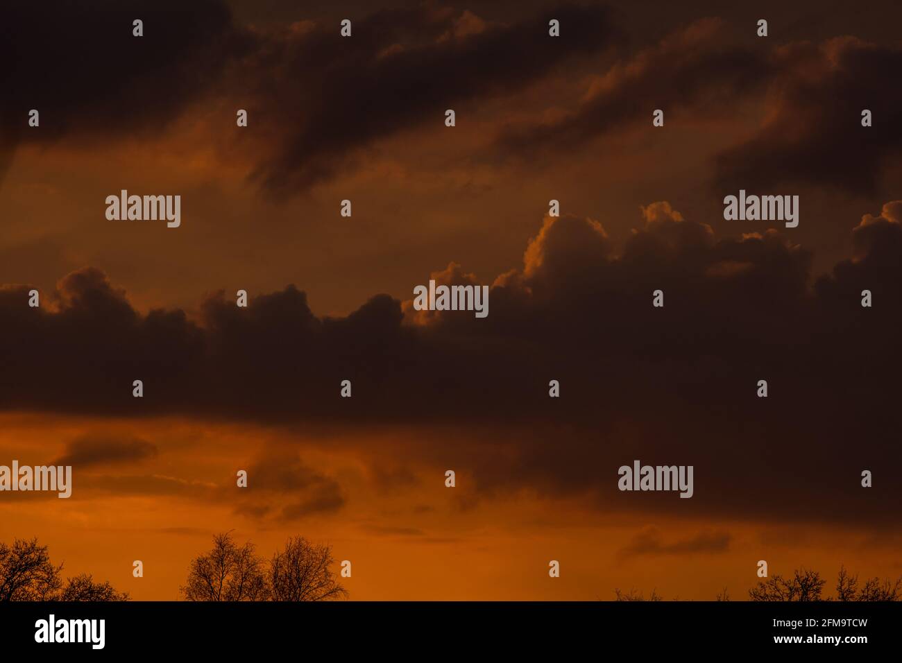 Stunning sunset with very colorful orange sky and clouds Stock Photo ...