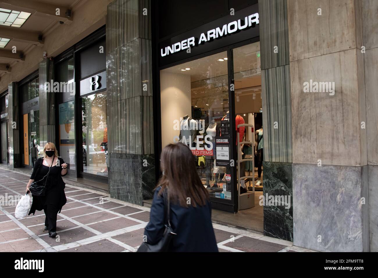 Athens, Greece. 07th May, 2021. People seen walking past a MAC store at  Ermou street close