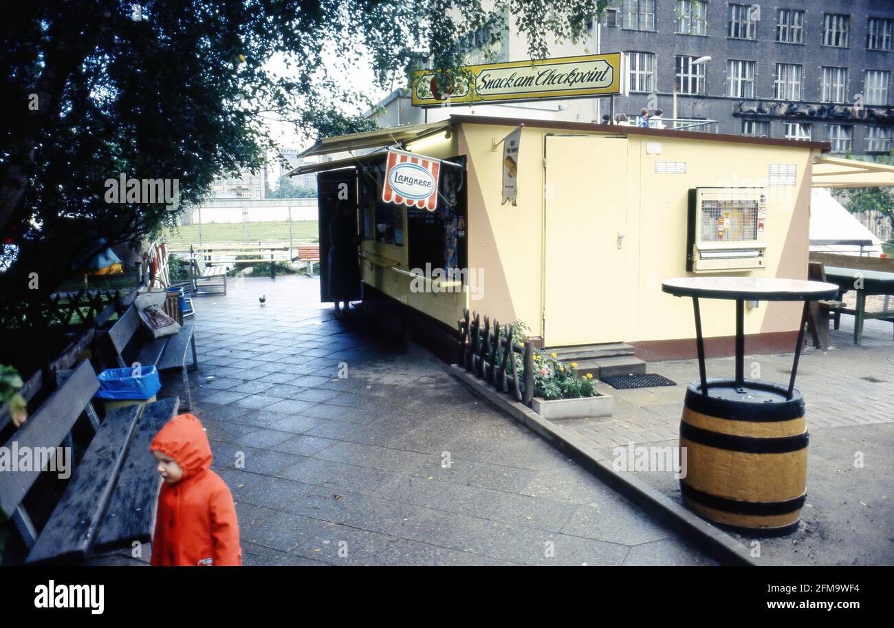 Berlin Wall, July 1984, in the center a kiosk / snack bar. In the background the wall. Stock Photo