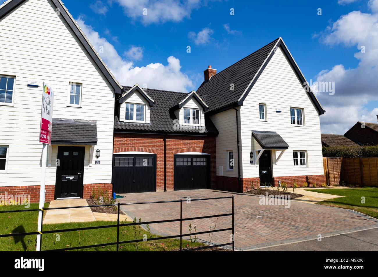 Woodbridge, Suffolk, UK May 01 2021: Newly built affordable homes targeted towards first time buys, government scheme, help to buy Stock Photo