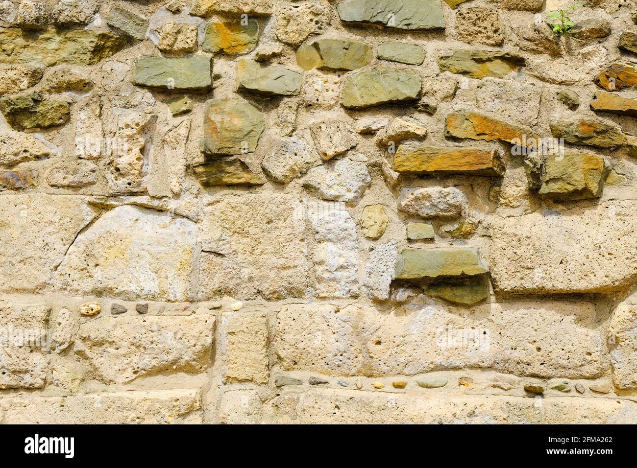 Medieval stone wall background and texture, close up Stock Photo - Alamy