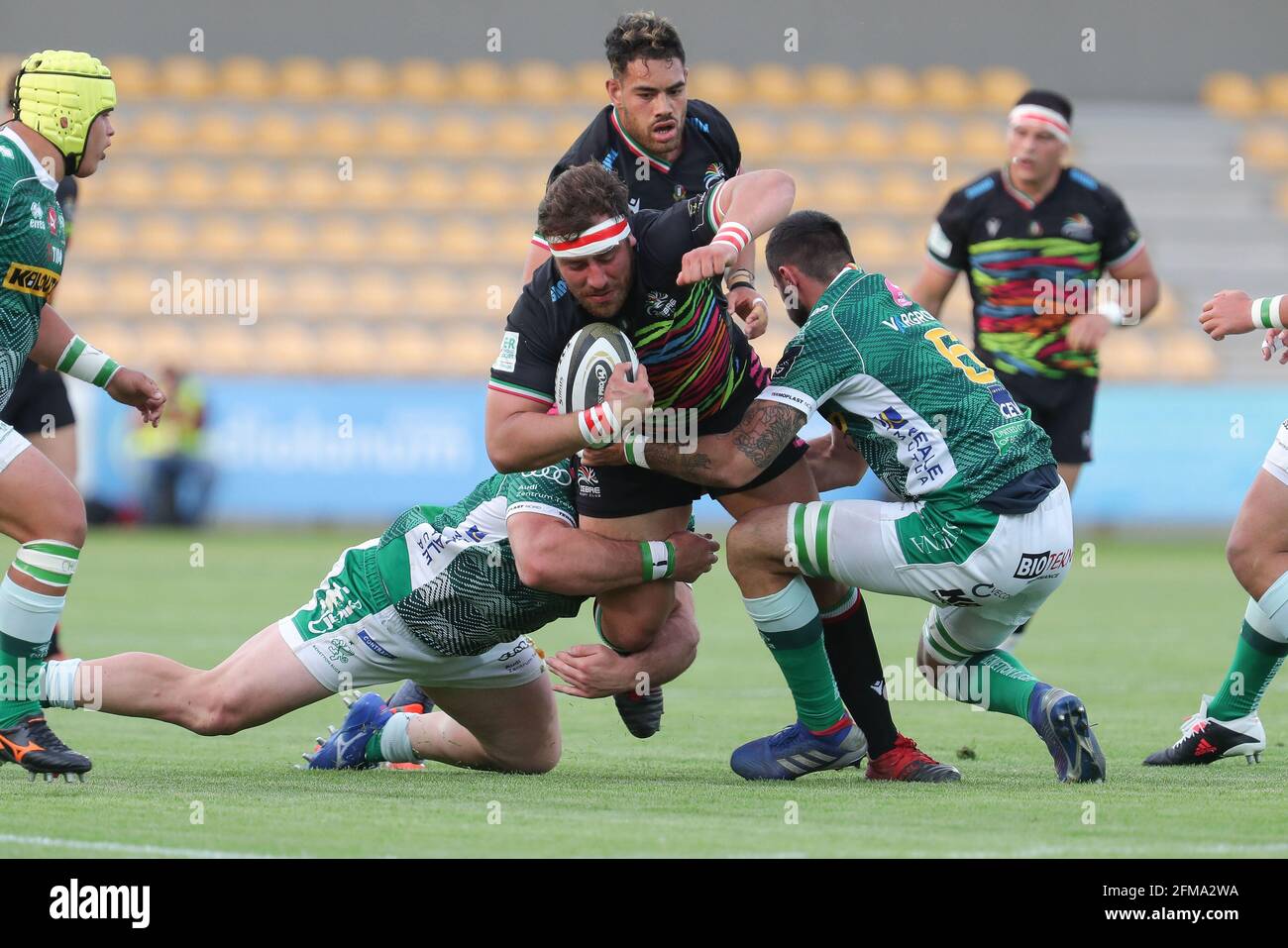 Parma, Italy. 07th May, 2021. Sergio Lanfranchi stadium, Parma, Italy, 07  May 2021, Eduardo Bello (Zebre rugby) is tackled by Riccardo Favretto and  Federico Ruzza (Benetton rugby) during Rainbow Cup - Benetton