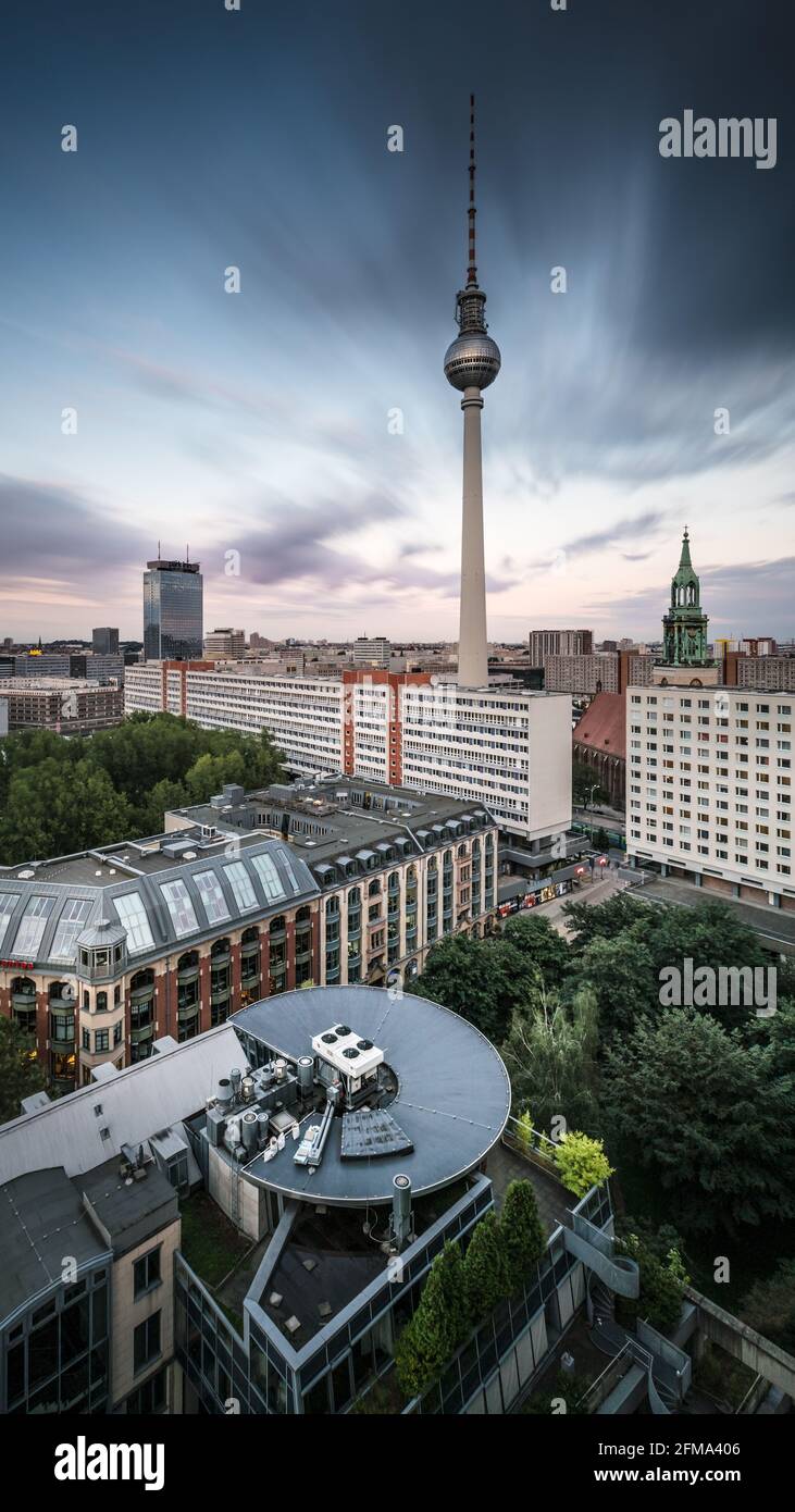 Fast moving clouds over the Berlin TV tower. Stock Photo