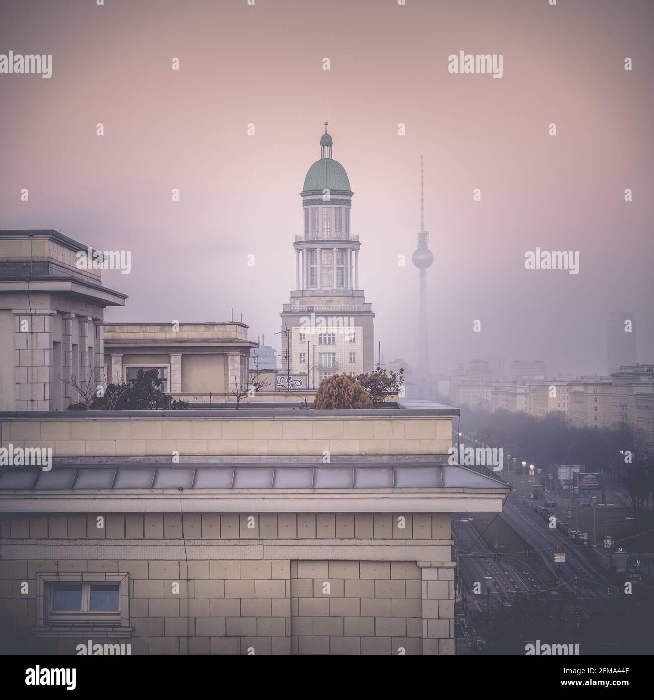 Berlin from above with a view of the foggy Karl-Marx-Allee on Frankfurt with the Berlin TV tower in the morning. Stock Photo