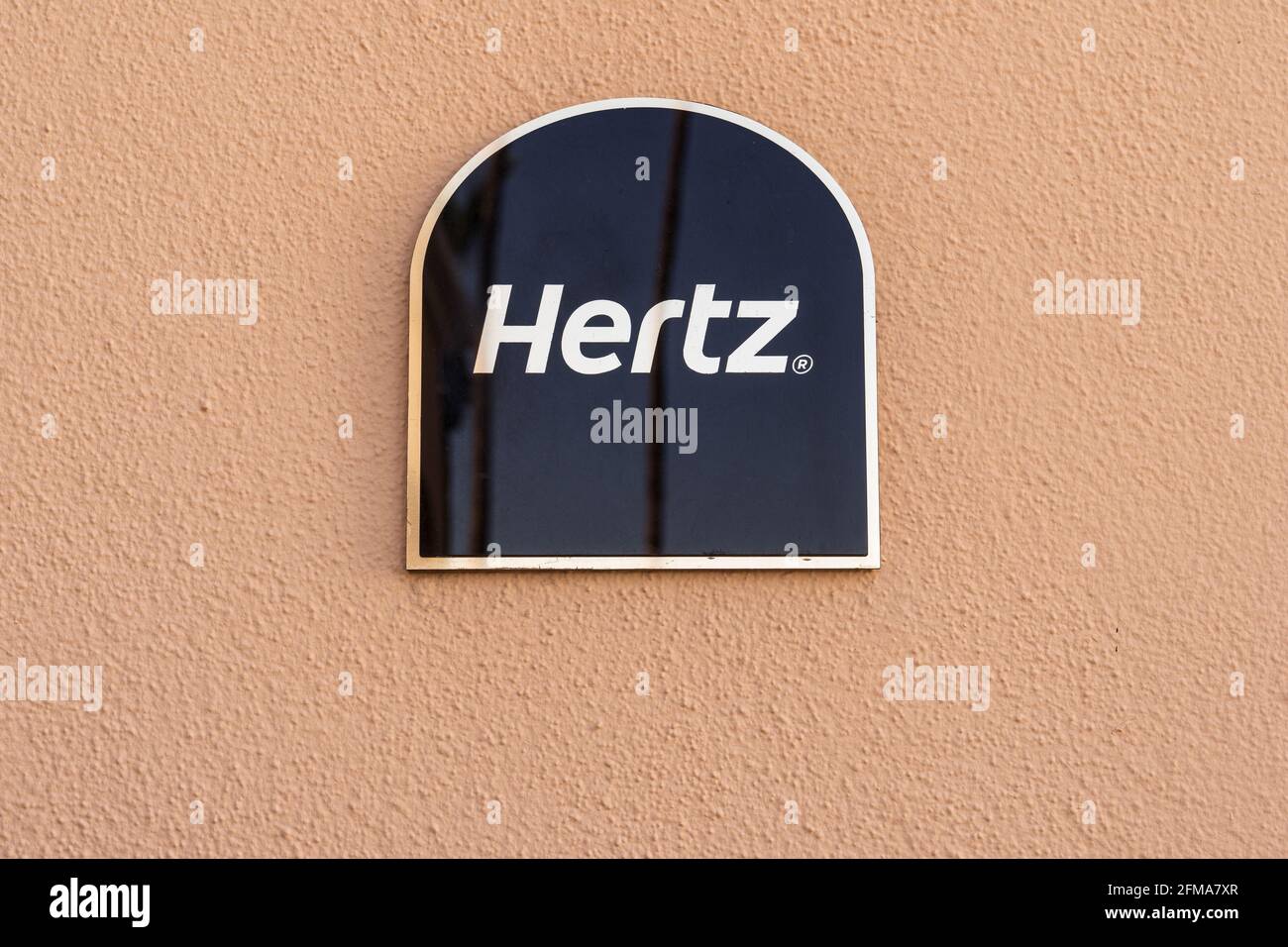 Chandler, AZ March 19, 2021 Reflective metal Hertz Rental Car sign