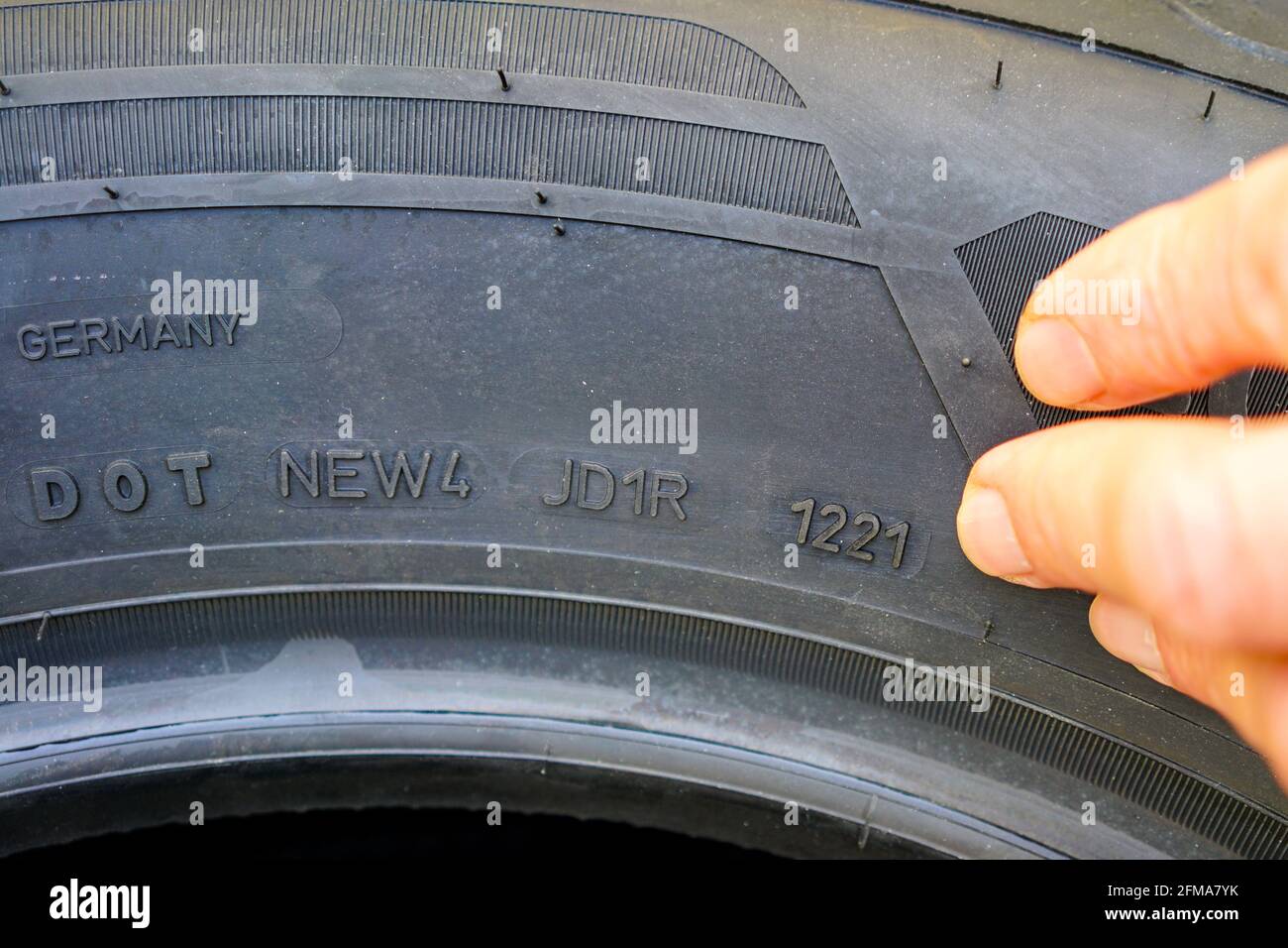 Side view of new tire with designation of week and year of tire production  Stock Photo - Alamy