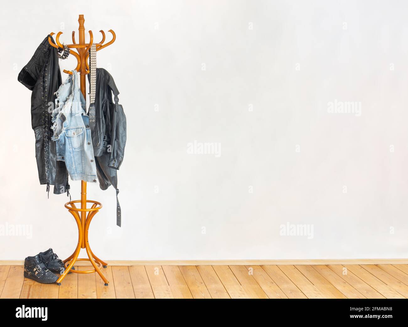 Coat hanger leather jacket hi-res stock photography and images - Alamy