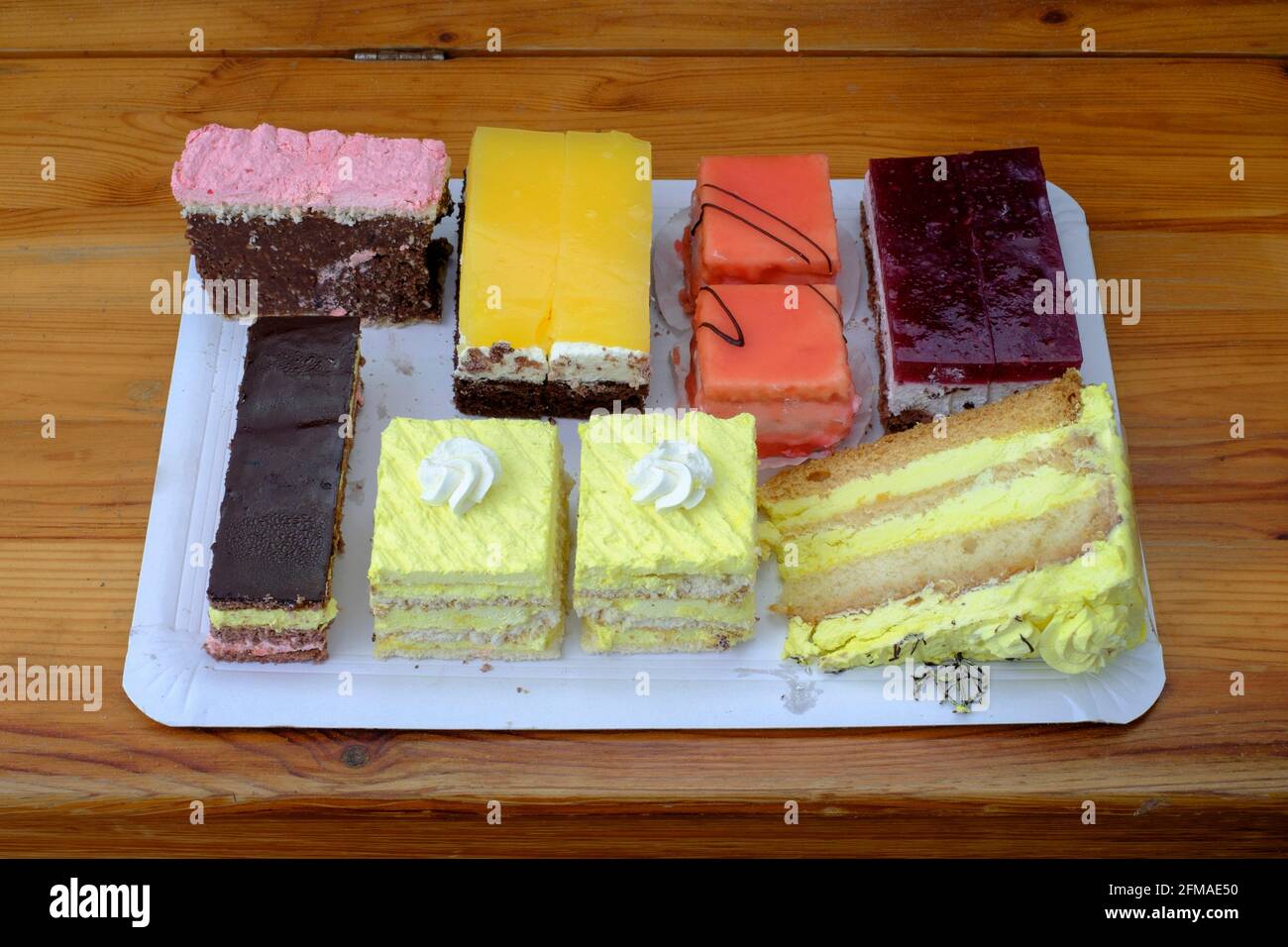 colourful selection of hungarian cakes on tray hungary Stock Photo