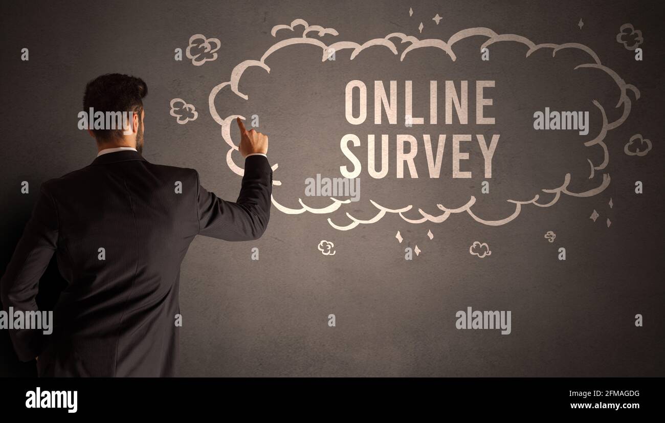 businessman drawing a cloud with inscription Stock Photo