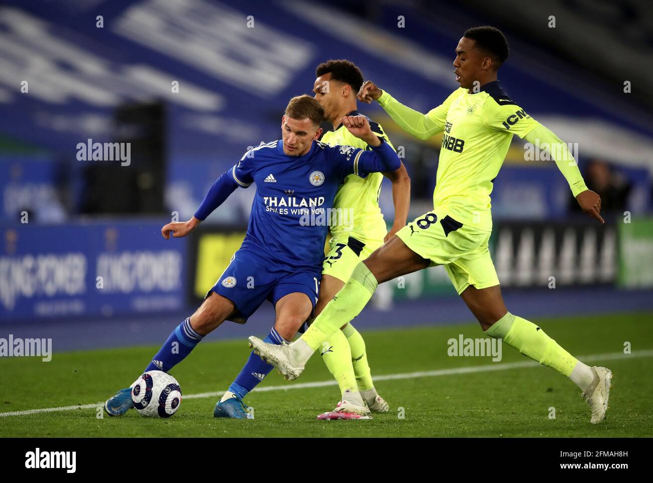 Leicester City's Marc Albrighton (left) and Newcastle United's Jacob Murphy  battle for the ball during the Premier League match at the King Power  Stadium, Leicester. Picture date: Friday May 7, 2021 Stock