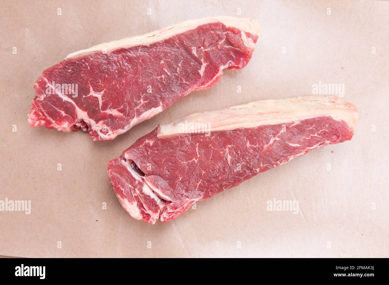 raw new york strip steak Stock Photo Alamy