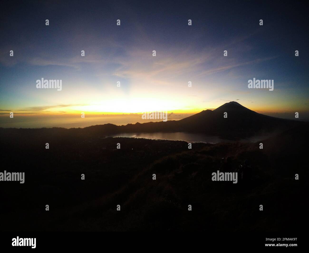 Sunrise from the top of mount Batur Stock Photo - Alamy