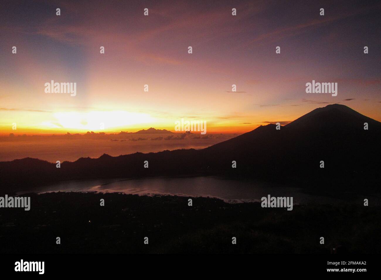 Sunrise from the top of mount Batur Stock Photo - Alamy