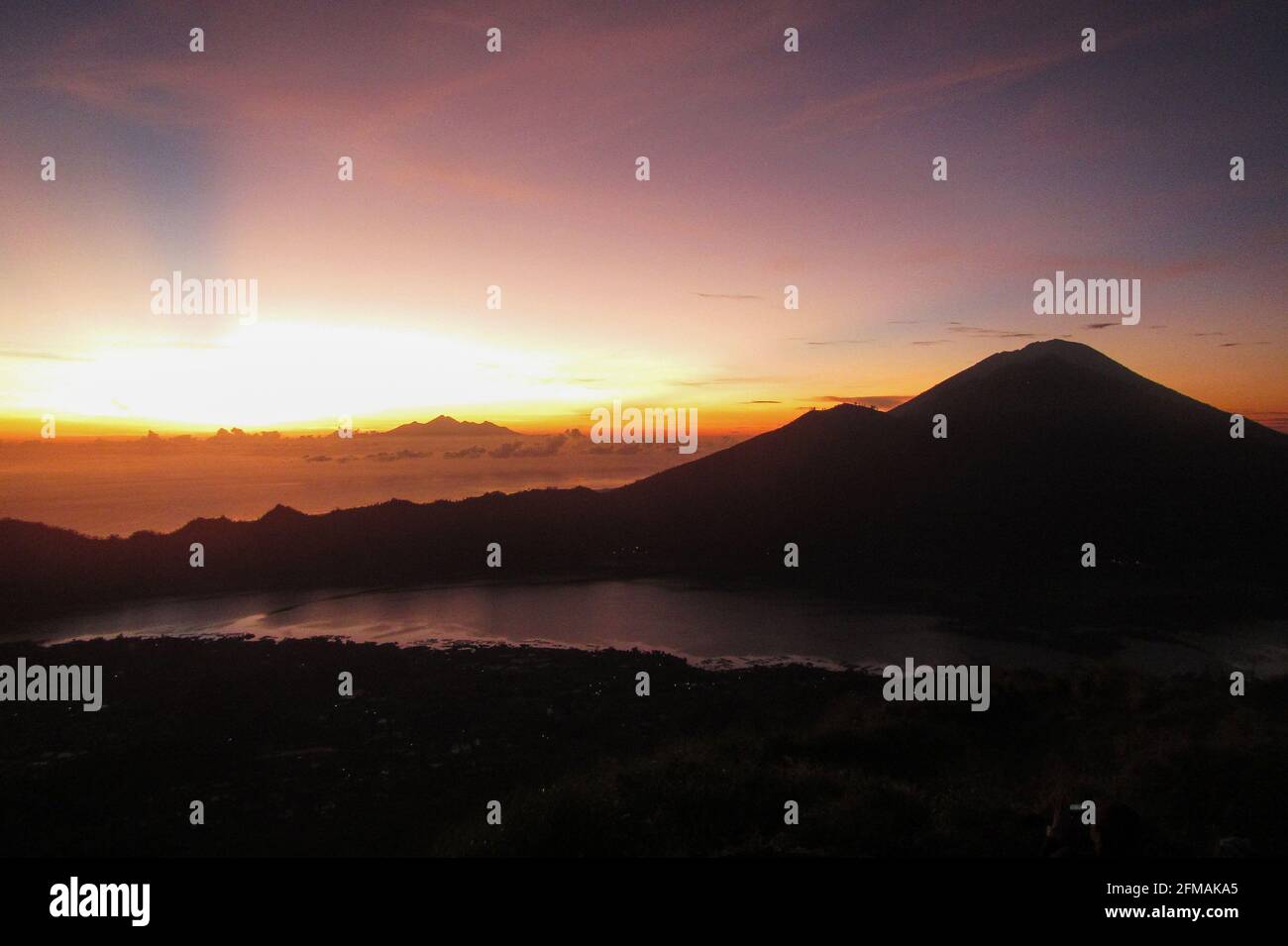 Sunrise from the top of mount Batur Stock Photo - Alamy