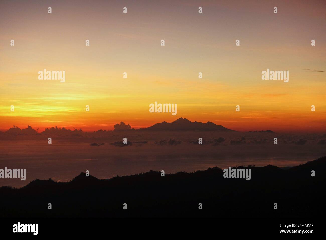 Sunrise from the top of mount Batur Stock Photo - Alamy