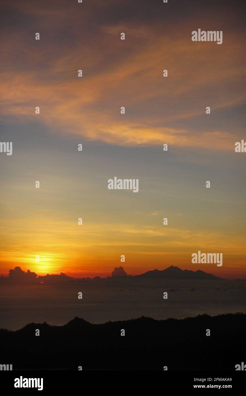 Sunrise from the top of mount Batur Stock Photo - Alamy