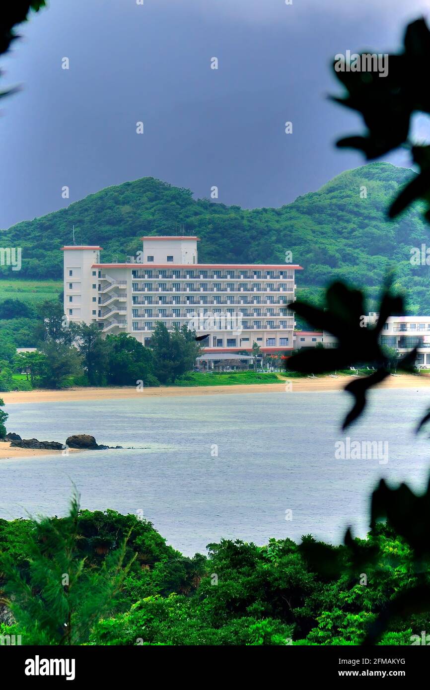 Ishigaki Seaside Hotel, View From Distance , In the Rain, Sukuji Beach, Kabira, Ishigaki, Yahema Islands, Okinawa, Ryukyu Islands, Japan Stock Photo
