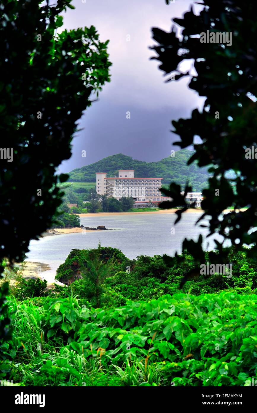 Ishigaki Seaside Hotel, View From Distance , In the Rain, Sukuji Beach, Kabira, Ishigaki, Yahema Islands, Okinawa, Ryukyu Islands, Japan Stock Photo