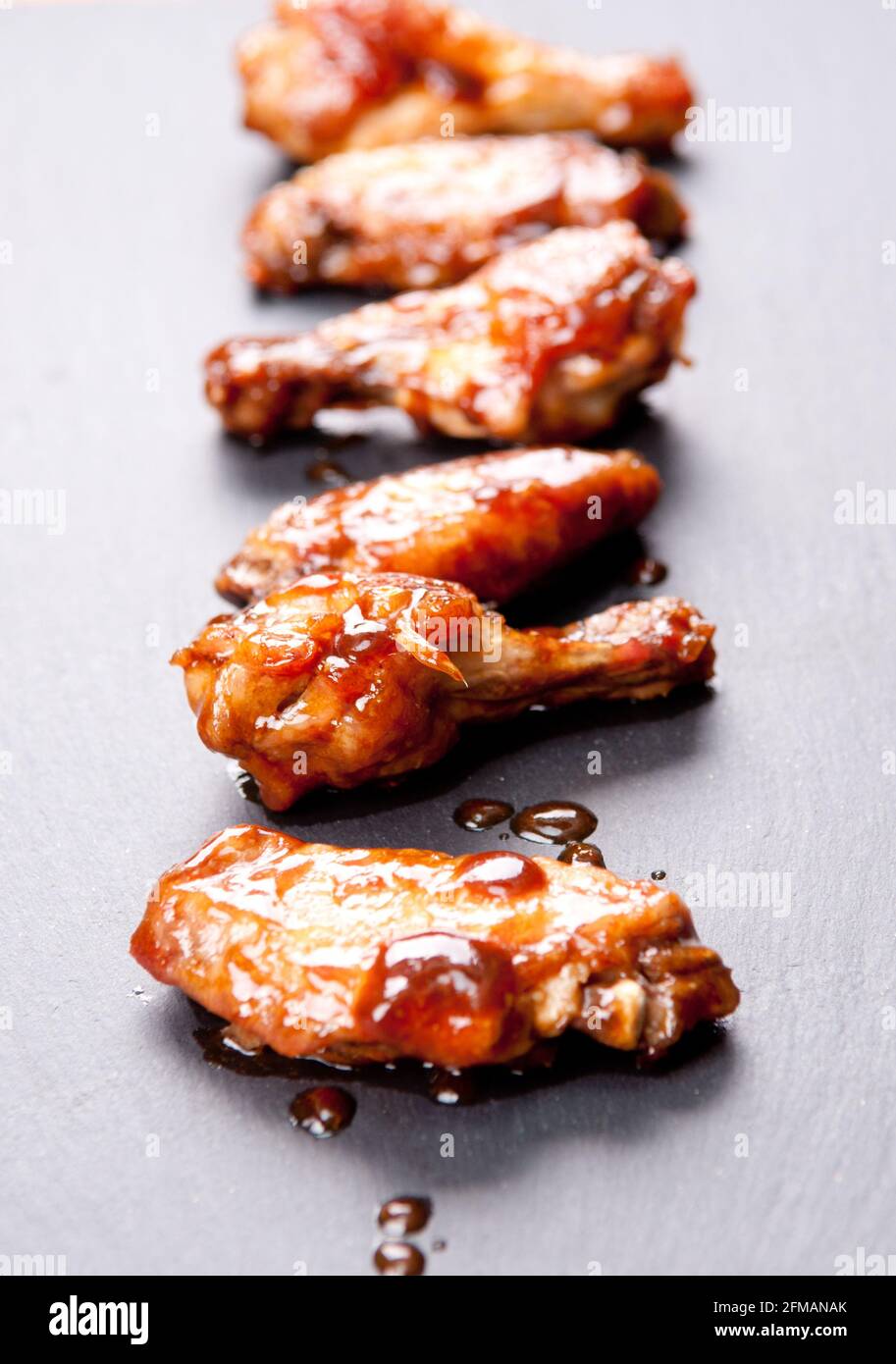 Spicy Chicken Wings For Supper Stock Photo Alamy spicy-chicken-wings-for-supper-stock-photo-alamy