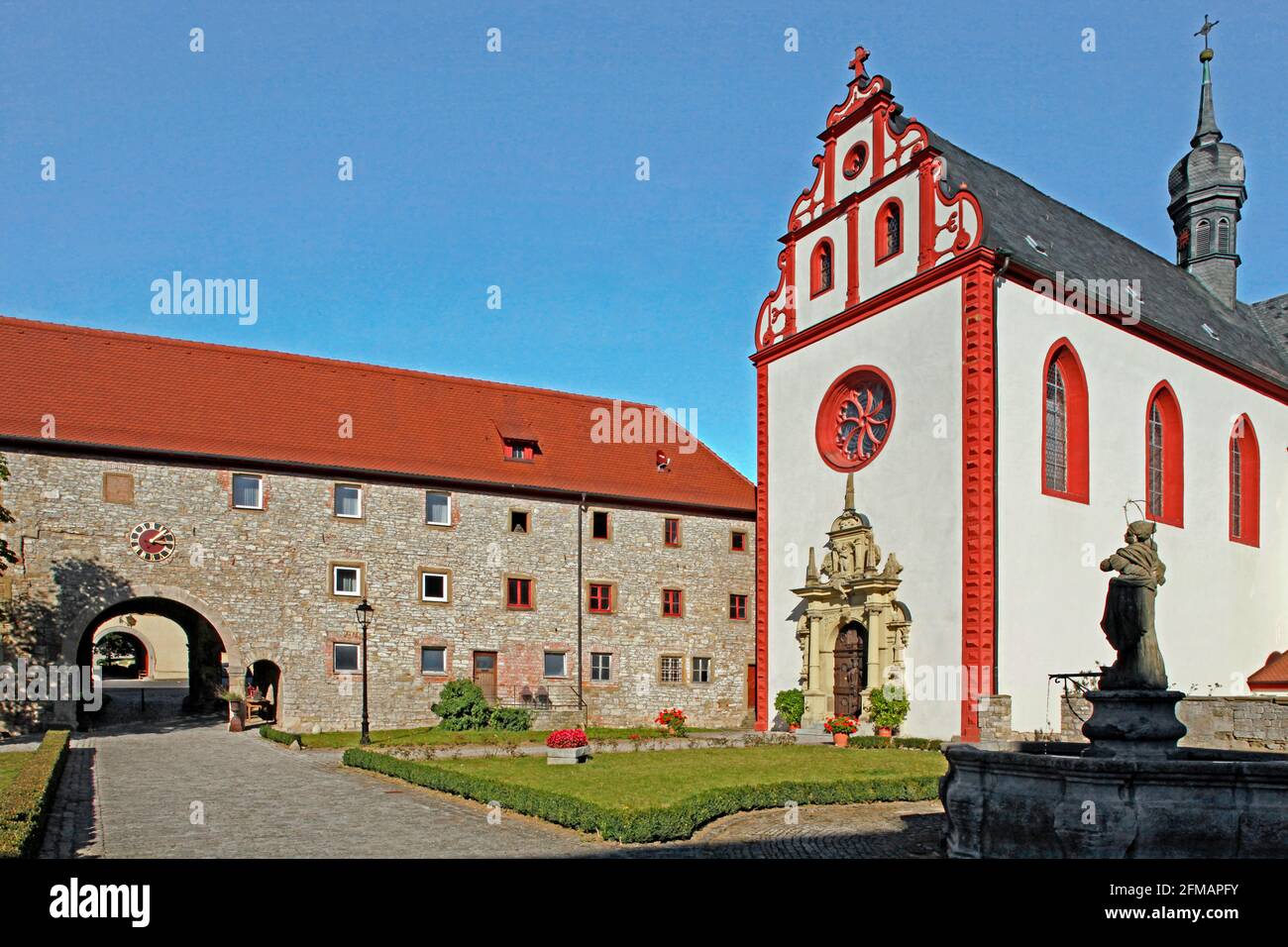 Former Carthusian monastery, cloister courtyard, monastery church, Tückelhausen - district of Ochsenfurt, Lower Franconia, Bavaria, Germany Stock Photo