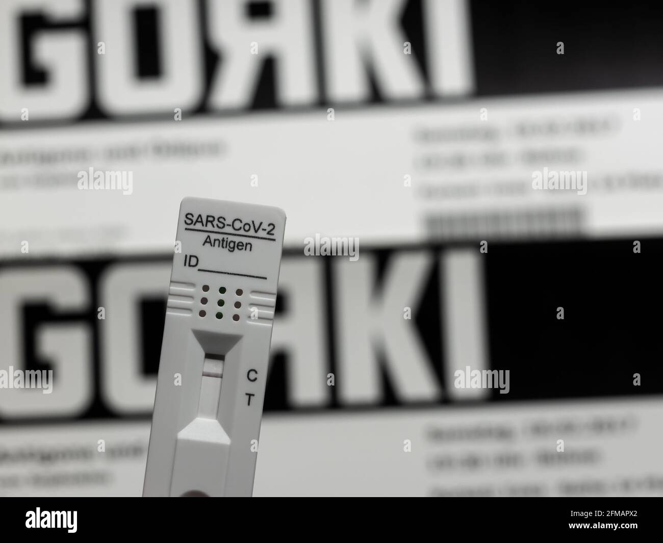 Rapid Antigen Corona Test Showing A Negative Result In Front of Two Gorki Theater Tickets, Berlin, Germany Stock Photo