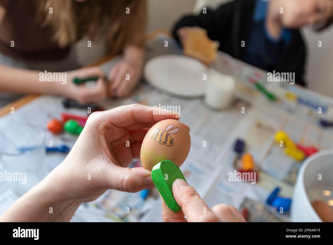 Children paint Easter eggs Stock Photo Alamy