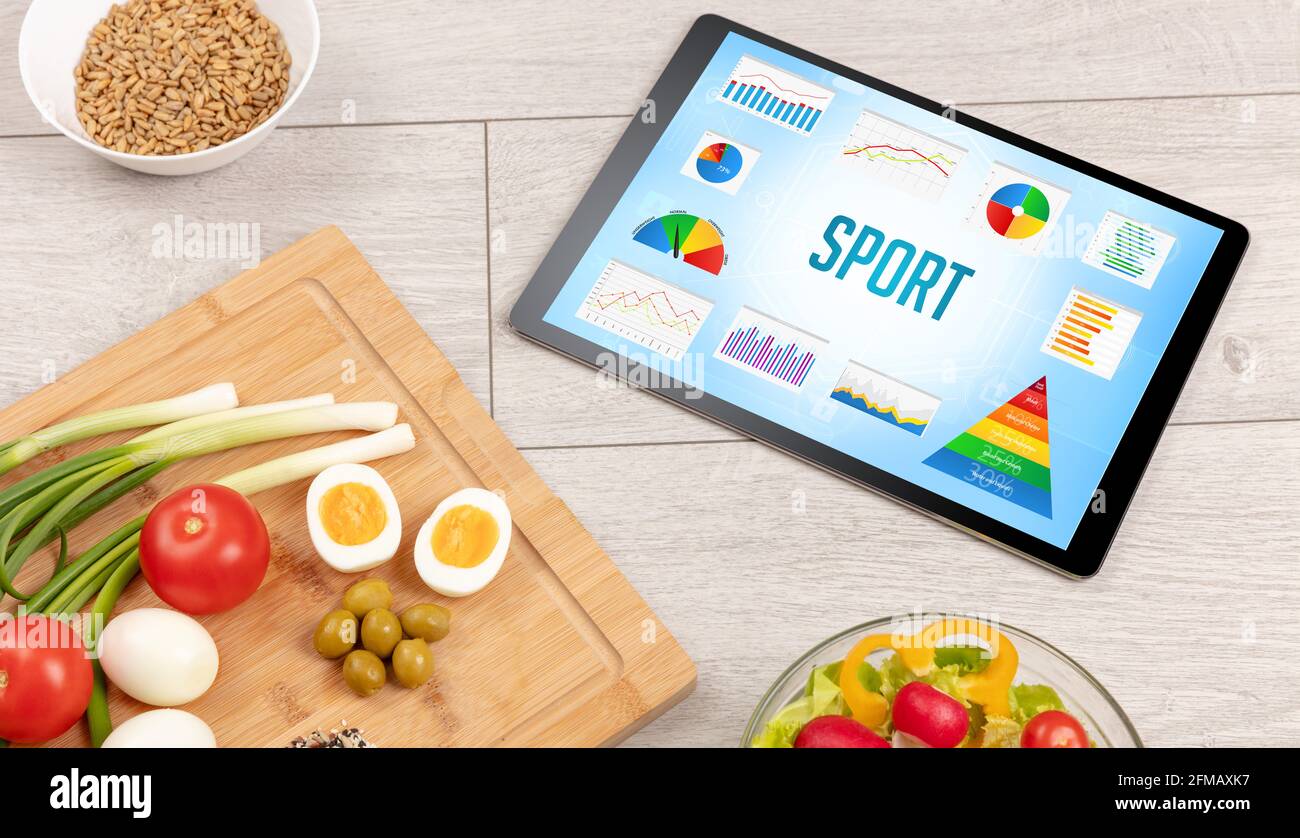 Organic food and tablet pc Stock Photo