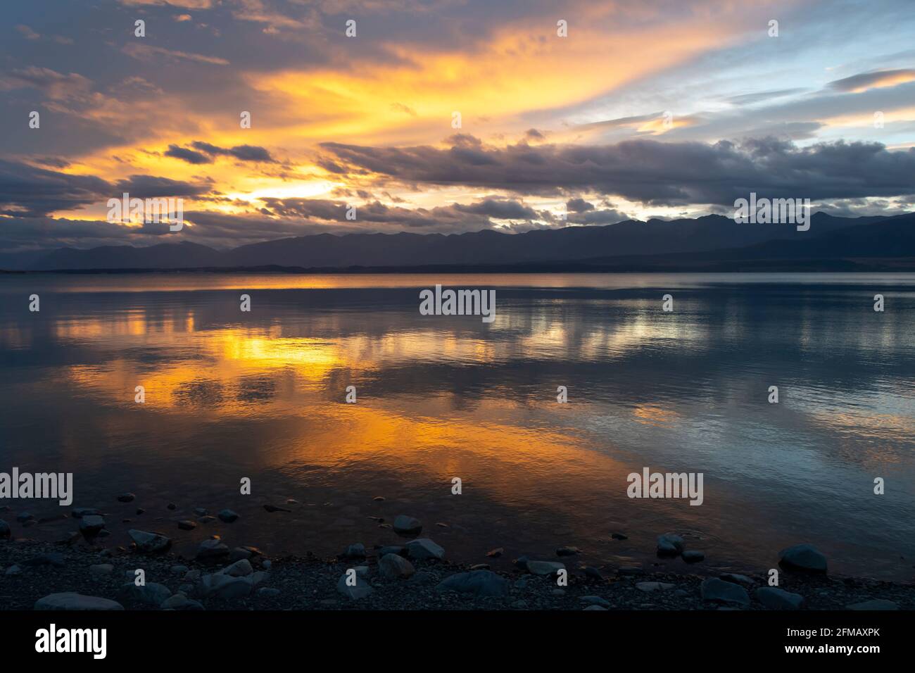 Sunset over Lake Pukaki, McKenzie Country, Canterbury, South Island, New Zealand Stock Photo