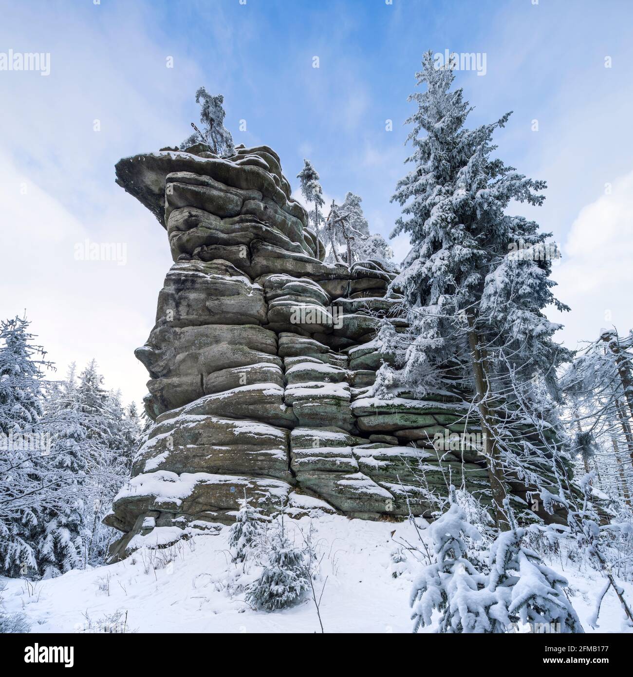 Germany, Bavaria, Franconia, Upper Franconia, Fichtelgebirge, rock formation Kreuzfelsen with snow in winter, climbing rock Stock Photo