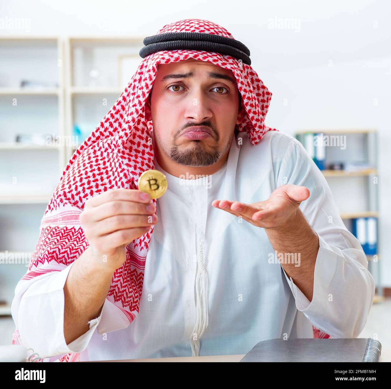 The arab man with bitcoin in cryptocurrency mining concept Stock Photo -  Alamy