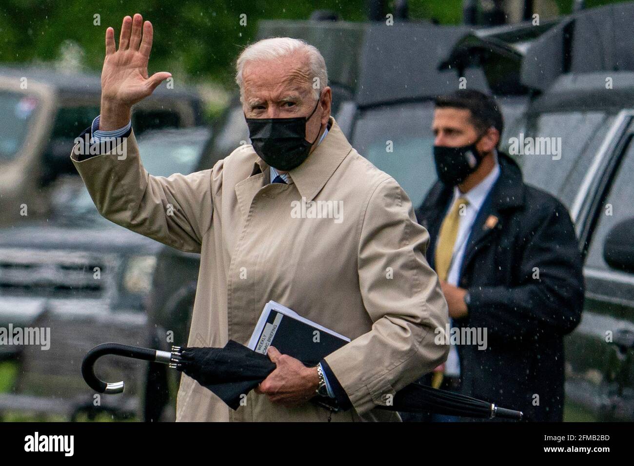 Washington DC, USA. 07th May, 2021. United States President Joe Biden waves to the media as he prepares to board Marine One on the Ellipse near the White House in Washington, DC as he prepares to depart for Camp David, the presidential retreat near Thurmont, Maryland on Friday, May 7, 2021. Credit: Tasos Katopodis/Pool via CNP Photo via Credit: Newscom/Alamy Live News Stock Photo