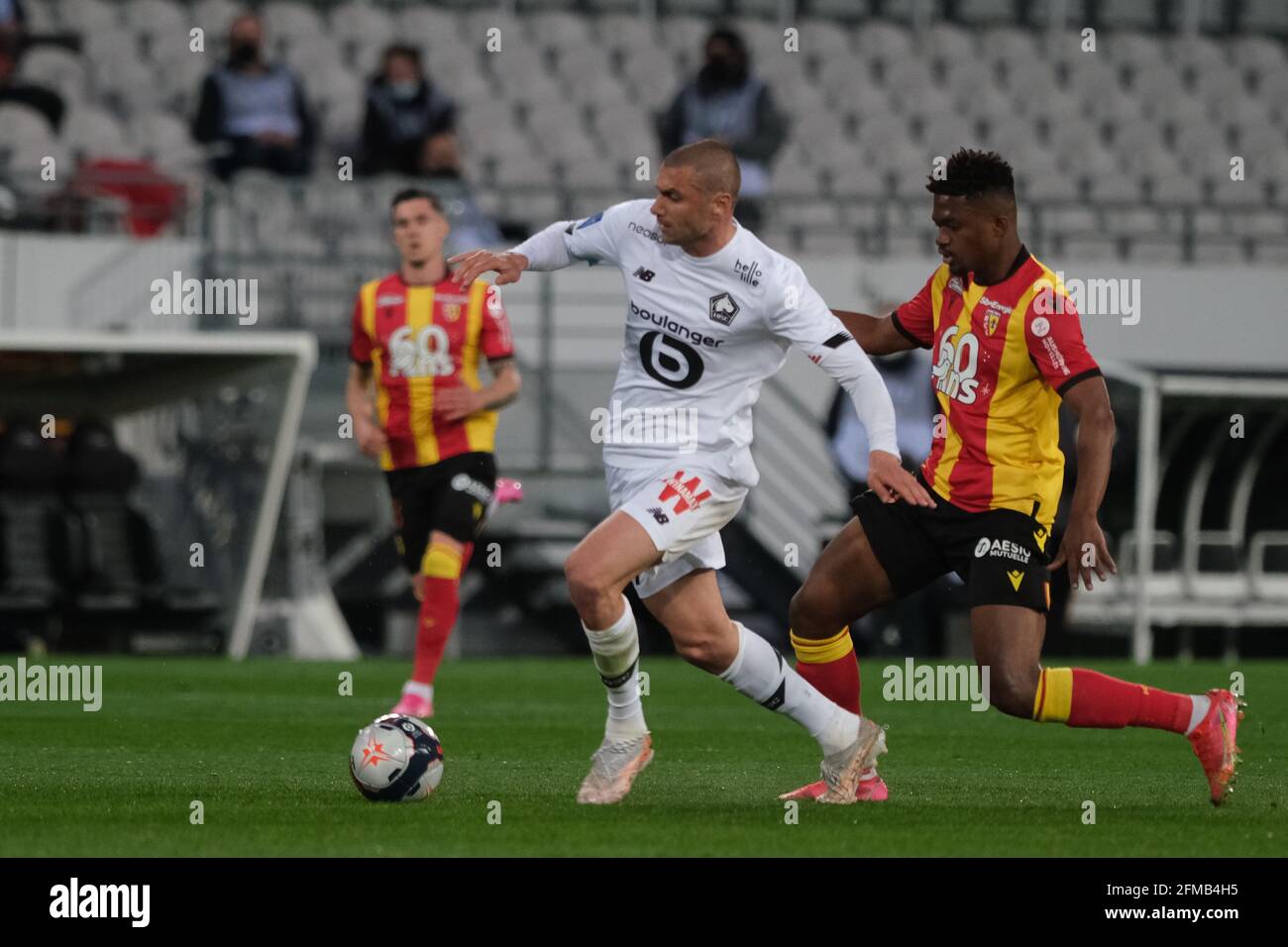 Lens, Hauts de France, France. 8th May, 2021. Forward of Lille BURAK YILMAZ  in action during the French championship soccer Ligue 1 Uber Eats Lille  against RC Lens at Felix Bollaert Delelis