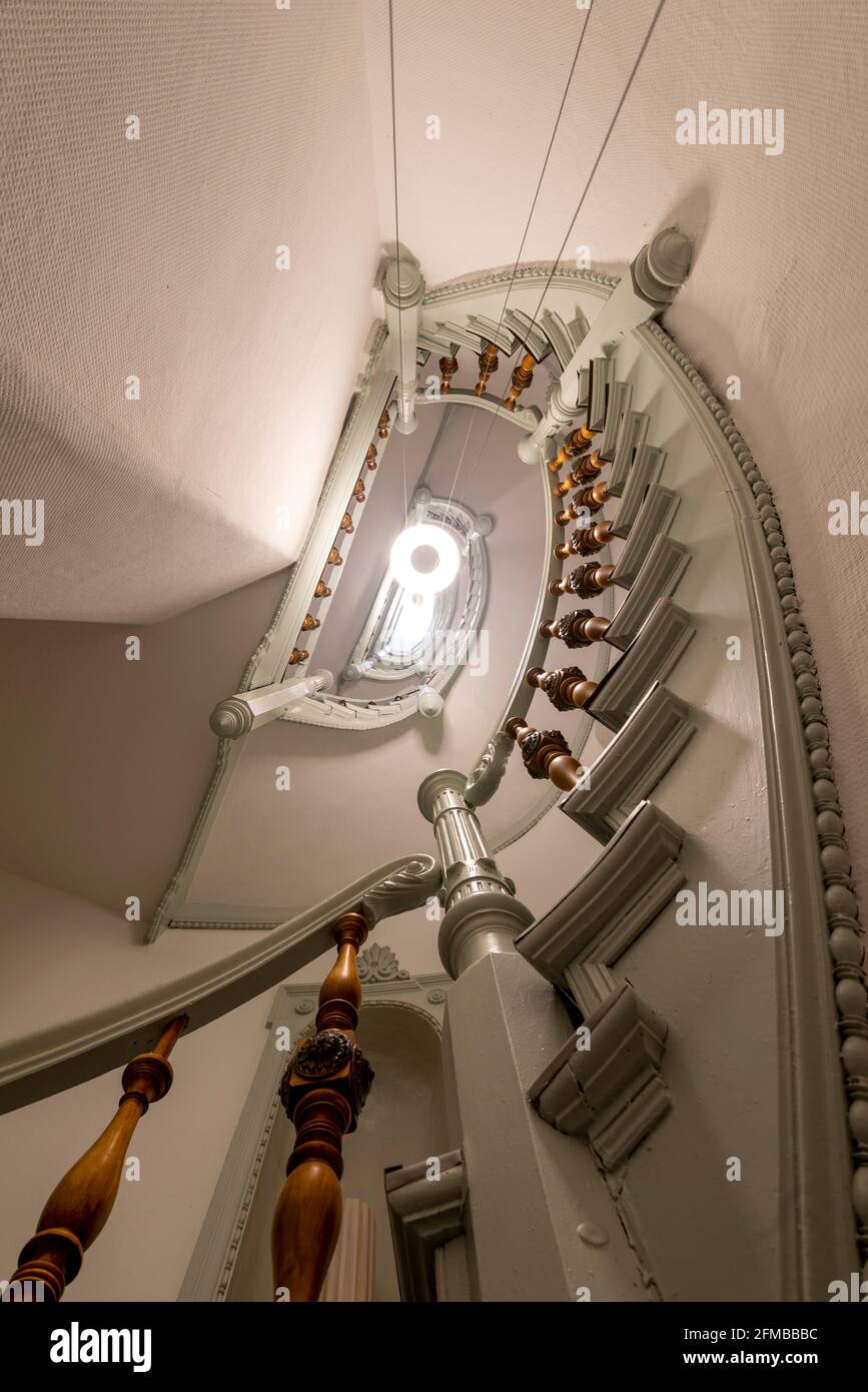 Germany, Saxony-Anhalt, Magdeburg, narrow staircase in a Wilhelminian style house. Stock Photo