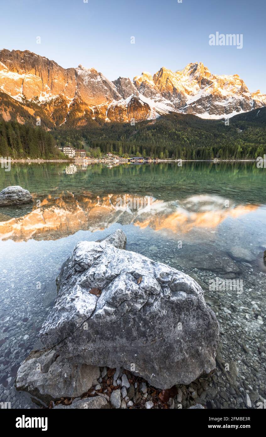 Zugspitze is reflected in lake eibsee hi-res stock photography and ...