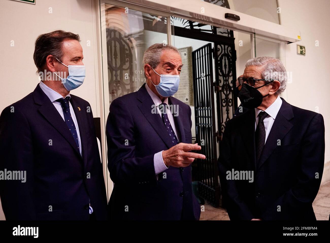 Malaga, Spain. 07th May, 2021. President of Agrupacion de Cofradias de Semana Santa de Malaga, Pablo Atencia (l), Former Mayor of Malaga, Luis Merino Bayona (c) and President of Fundacion Unicaja Braulio Medel (r) during the exhibition at Centro Cultural Fundacion Unicaja. 'Un siglo de esplendor' is an exhibition that shows the artistic heritage of the Holy Week brotherhoods of Malaga and is one of the events organized by Agrupacion de Cofradias de Semana Santa de Malaga for the centenary of the institution. Credit: SOPA Images Limited/Alamy Live News Stock Photo